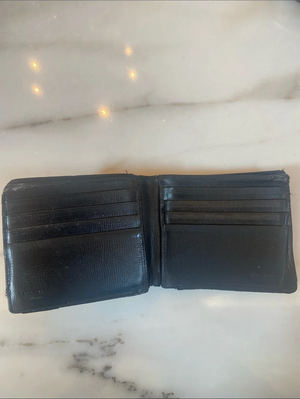 Prada Black Men’s Bifold Wallet with Metal Logo Plaque